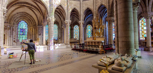 Artist painting in Saint-Denis Basilica Cathedral