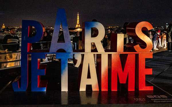 'Paris je t'aime' sign on Galeries Lafayette observation deck.