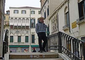 Gondolier on Ponte di Santa Maria Mater Domini