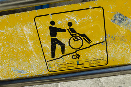 Sign for wheelchair users on Venice's Ponte delle Guglie bridge