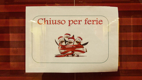 'Closed for the holidays' sign in Venice, Italy.